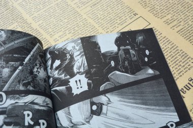 25 Haziran 2023 'te, Wonosobo.Endonezya' daki ahşap masa zeminine karşı komik bir fotoğraf açılıyor.