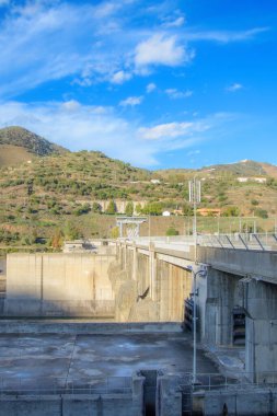 Beautiful mountain landscape with Regua dam on river in Portugal