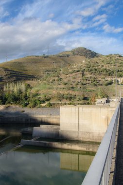 Beautiful mountain landscape with Regua dam on river in Portugal