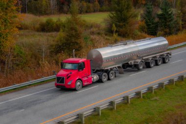 red cargo truck on a highway, logistic concent  clipart