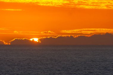 Sunset over the Atlantic above the Safi fortress in Morocco clipart