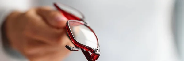 Close Person Give Red Glasses Female Oculist Hands Hold Pair — стоковое фото