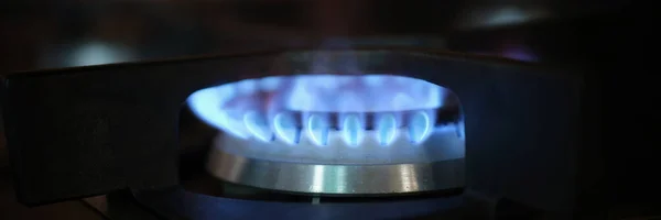 Cooking gas stove fire and electric stove. Burning fire on gas stove and cooking gas danger concept