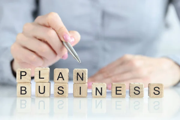 Close Businesswoman Pointing Words Plan Business Collected Wooden Cubes Business — Stock Photo, Image