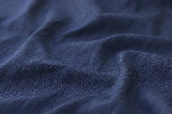 深蓝色牛仔裤面料面料纹理背景的顶视图 用于设计艺术作品 棉或牛仔纺织品背景图案 — 图库照片