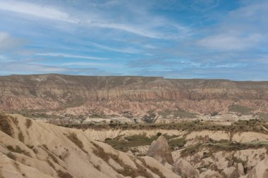 Panoramic view of the Cappadocia valley with rocky mountains. Cappadocia, Goreme National Park One of the famous tourist attractions in Turkey.