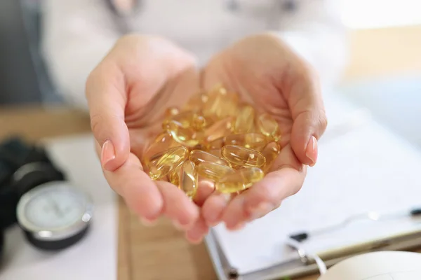Close Doctor Holding Transparent Yellow Capsules Hands Vitamin Healthy Medical — Φωτογραφία Αρχείου