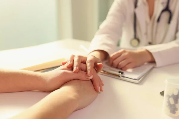 Doctor Puts Her Hand Hands Patient Sitting Her Medical Clinic — Stock Photo, Image
