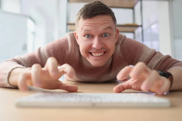 Crazy Man Types White Keyboard Fingers Looking Camera Toothy Smile — Stock Photo, Image