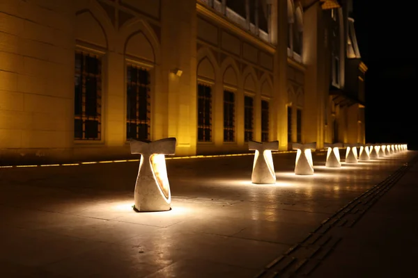 stock image Glowing lanterns near ancient Camlica Mosque in night Istanbul. Famous religious landmark of Turkey. Largest Muslim temple in world