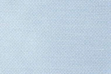 Atölyede satılmak üzere tasarlanmış açık mavi tekstil. Arka plan olarak yüksek kaliteli kumaş dokusu. Katalog fotoğraf örneği