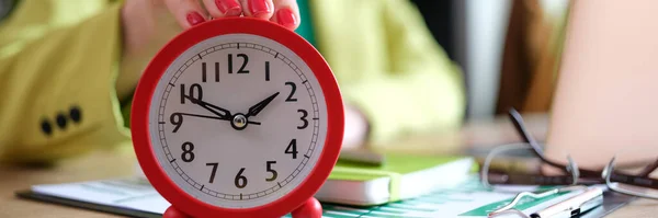 Close Woman Putting Red Alarm Clock Desk Time Management Deadline — Stock Fotó