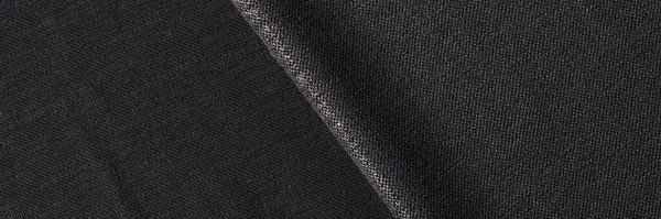 黑色面料作为背景紧密相连 黑色纺织品背景 — 图库照片