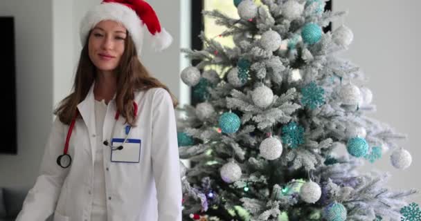 Female Doctor Smiling Christmas Tree Happy New Year Merry Christmas — Stock Video