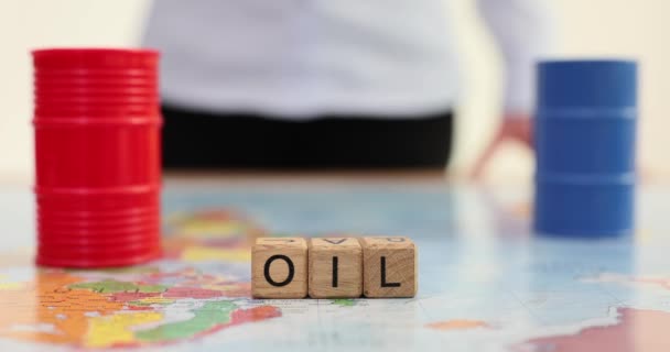 Woman Puts Barrel Oil World Map Word Oil Oil Petroleum — Stock Video