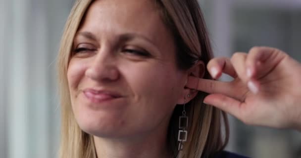 Nervous Young Woman Scratching Ear Finger Itchy Ears Adult — Stock Video