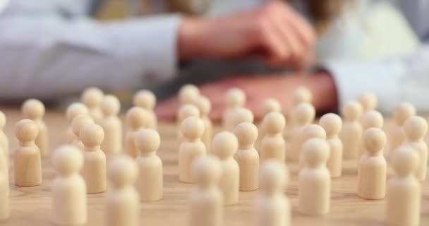 Woman Hand Takes White Figurine Human Surrounded Figurines Form Society — Stock Video