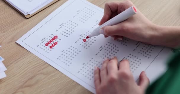 Closeup Woman Hand Marking Dates Calendar Red Marker Business Planning — Stock Video