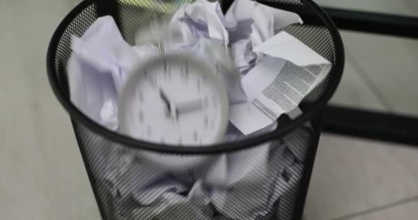 Alarm Clock Throwing Trash Bin Crumpled Documents Closeup Movie Slow — Stock Video