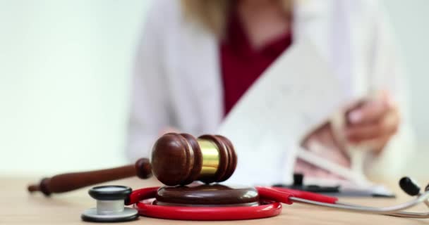 Judge Gavel Stethoscope Lying Background Doctor Closeup Movie Slow Motion — Stock Video