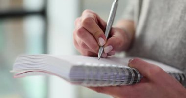 Journalist writing with ballpoint pen in notepad closeup 4k movie slow motion. To do list for today concept