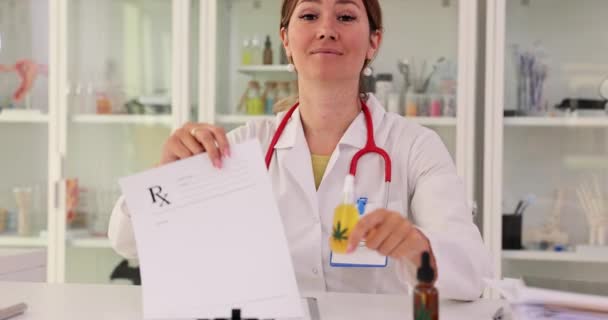 Doctor Holding Cannabis Oil Paper Prescription Movie Slow Motion Legalization — Stock videók