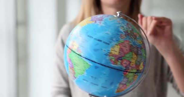 Woman Travel Agent Spinning Globe Closeup Movie Slow Motion Travel — Vídeos de Stock