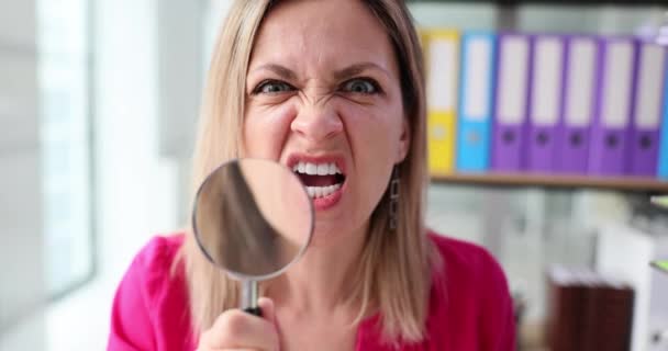 Angry Woman Screaming Magnifying Glass Front Mouth Lot Documents Movie — 图库视频影像