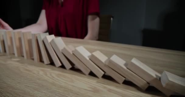 Hand Stopping Falling Wooden Blocks Table Closeup Movie Slow Motion — стокове відео