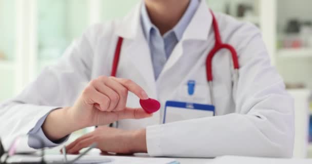 Cardiologist Holds Red Heart Hands Closeup Doctor Shows Heart Disease — Stock Video