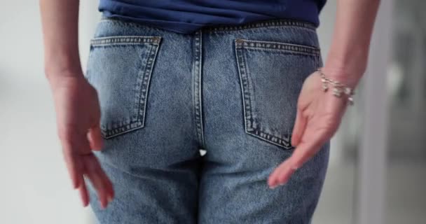 Young Woman Jeans Holds Butt Girl Feeling Anal Pain — Stok video