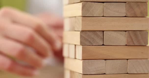 Closeup Hand Holding Wooden Jenga Game Business Risk Concept — Stock Video