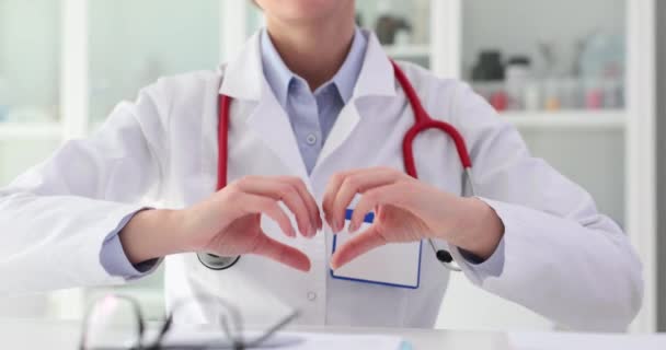 Doctor Cardiologist Therapist Shows Heart Gesture Closeup Charity Medicine — Stock Video