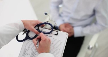 Sex psychologist talks with male patient about sexual problems and penis enlargement. Erectile disfunction
