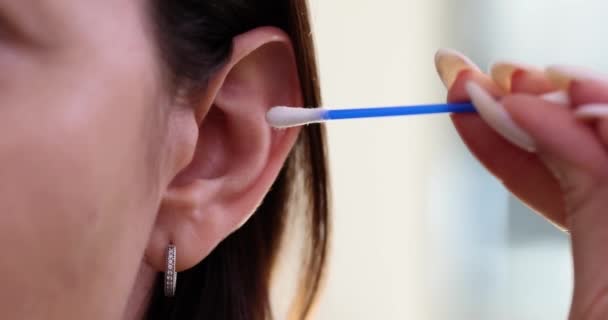 Young Woman Cleans Ear Cotton Swab Ear Hygiene Healthcare — Stock Video