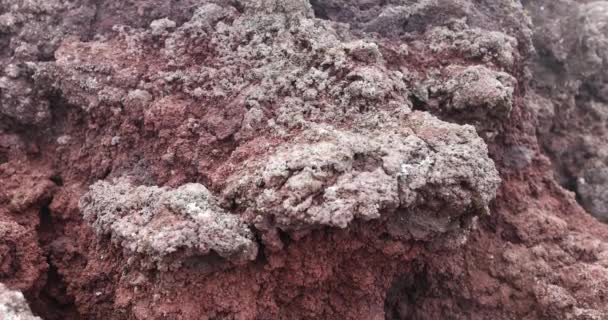 Nahaufnahme Von Vulkangestein Mit Rotem Muster Stein Hintergrund Textur — Stockvideo