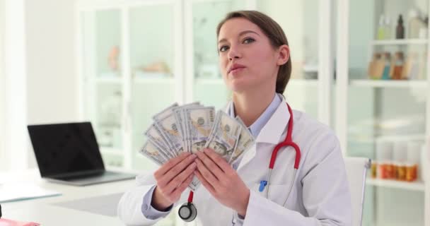 Corrupt Female Doctor Counts Money Clinic Doctor Satisfied Expression Face — Stock Video
