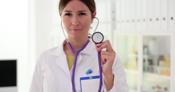 Doctor Holds Stethoscope Examining Insuring Professional Emergency Medical Care Royalty Free Stock Footage