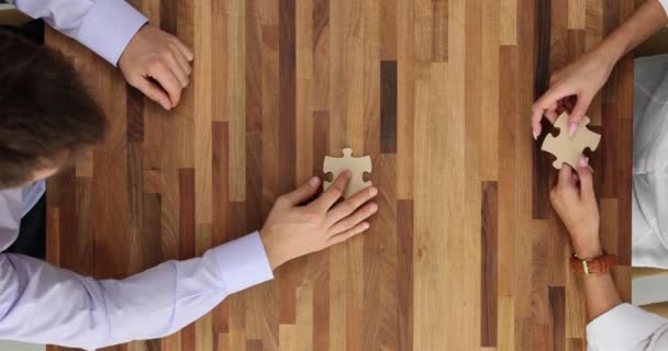 Hand Connects Puzzle Piece Business Partners Top View Business Solution — Stock Video