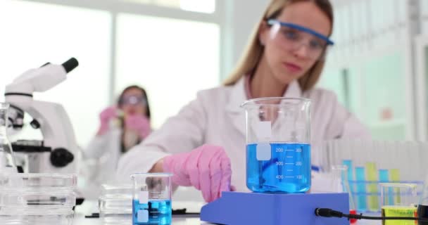 Scientific Chemist Laboratory Includes Magnetic Stirrer Flask Blue Liquid Magnet — Stock Video