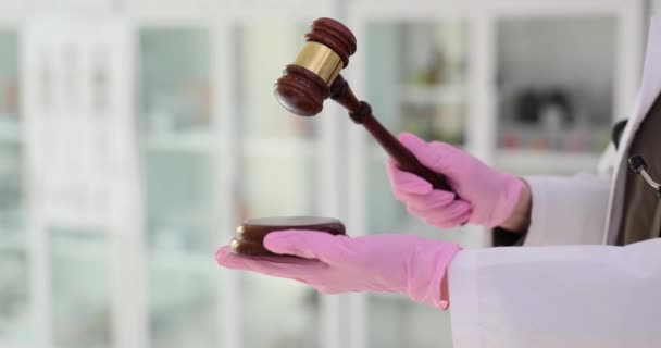 Doctor Taps Judge Gavel Clinic Office Administrator Provides Law Authority — Stock Video