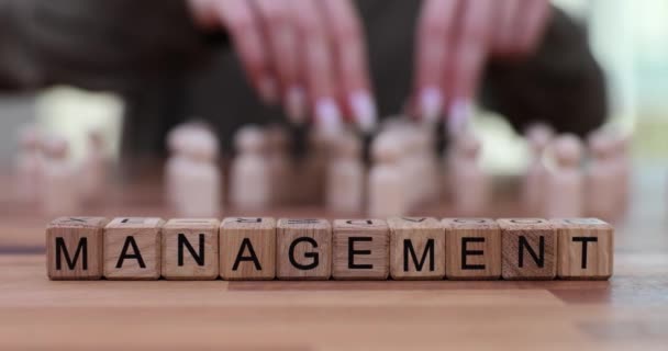 Word Management Made Wooden Blocks Woman Manager Changes Places Figures — Stock Video