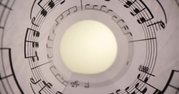 带有音乐音符的白皮书叠成了特写 音乐教育 — 图库视频影像