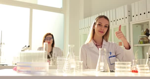 Women Scientists Show Cool Sign Fingers Laboratory Researches Exude Confidence Royalty Free Stock Footage