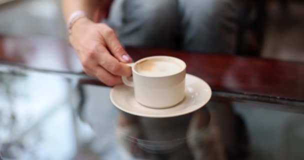 Woman Visitor Savors Cup Coffee Cozy Restaurant Young Guest Indulges — Stock Video