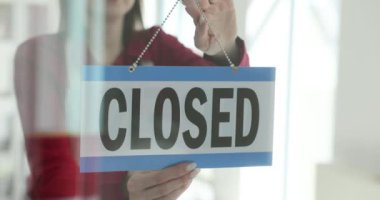 Store is open sign flips from closed to open. Start of the working day shop or cafe