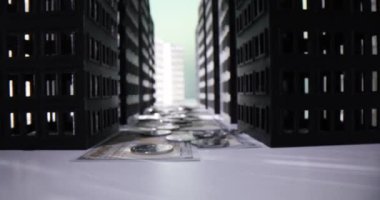 Konut binalarının yapay modeli ve masasında bozuk paralar olan banknotlar. Gayrimenkul projelerine yatırım parası kavramı