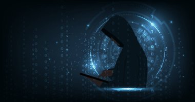 Cybercrime concept. The man in a hood is standing and hacking with the iPad on a dark blue background.	
