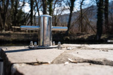 cross-shaped wooden sign on the ground