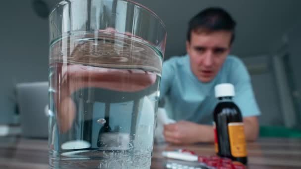 Sick Man Throws Pill Glass Water Wiping Running Nose Napkin — Vídeos de Stock